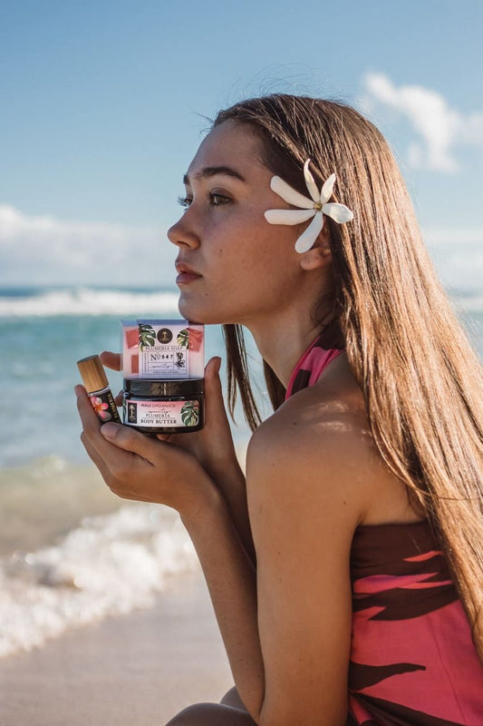 Girl on the Beach with Plumeria Bath & Body from Hawaii